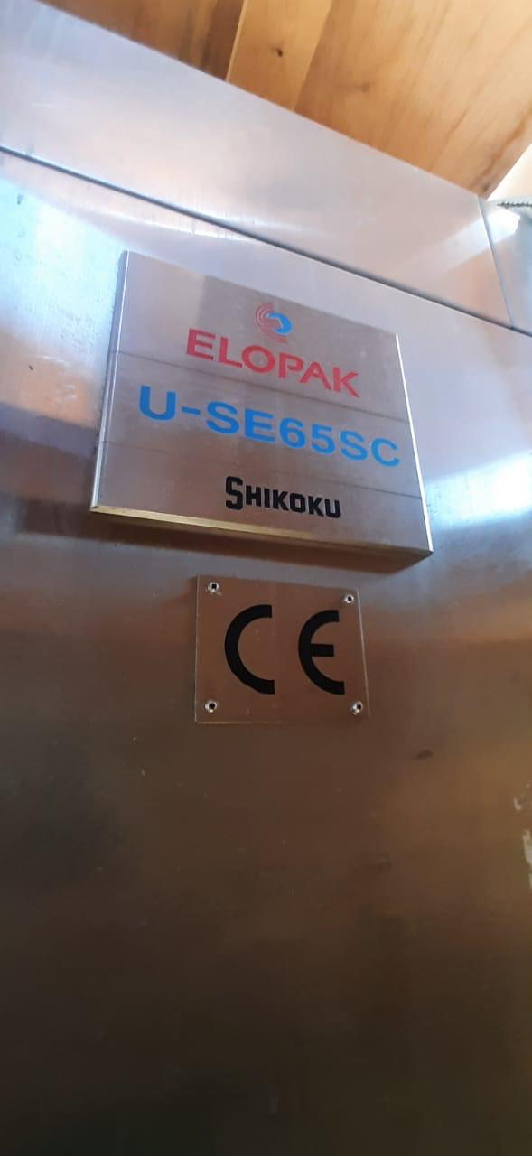 GABLE TOP COLD FILLING AND CAPPING MACHINE FOR SALE